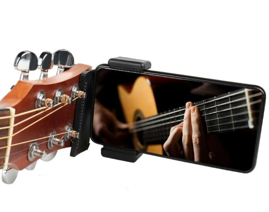Soporte con clip para guitarra y teléfono